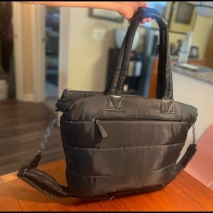 Isaac Mizrahi, puffy tote. Black w shoulder strap, & small wristlet. Never used.